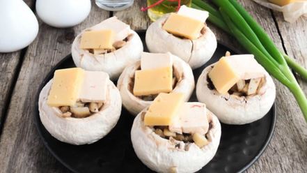 Рецепт фаршированных шампиньонов с ветчиной