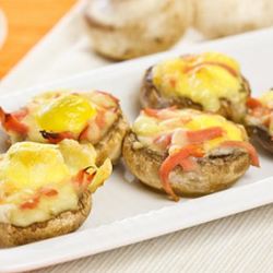 Рецепт Шляпок шампиньонов, фаршированные перепелиными яйцами