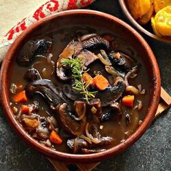 Рецепт Тушеных королевских шампиньонов с овощами