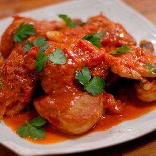 Рецепт Курицы в томатном соусе в духовке