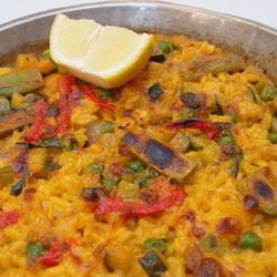 Рецепт Овощной паэльи с зеленым горошком и шампиньонами