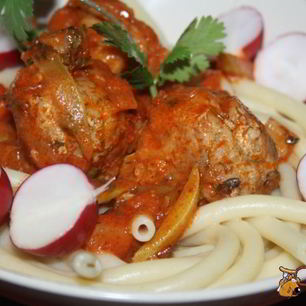 Рецепт Свиного-говяжьих тефтельки тушеные в томате с овощами