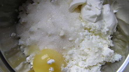 Рецепт вареников с творогом, запеченные в сливках