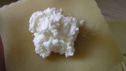 Рецепт вареников с творогом, запеченные в сливках