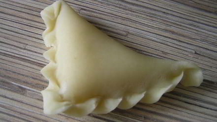 Рецепт вареников с творогом, запеченные в сливках