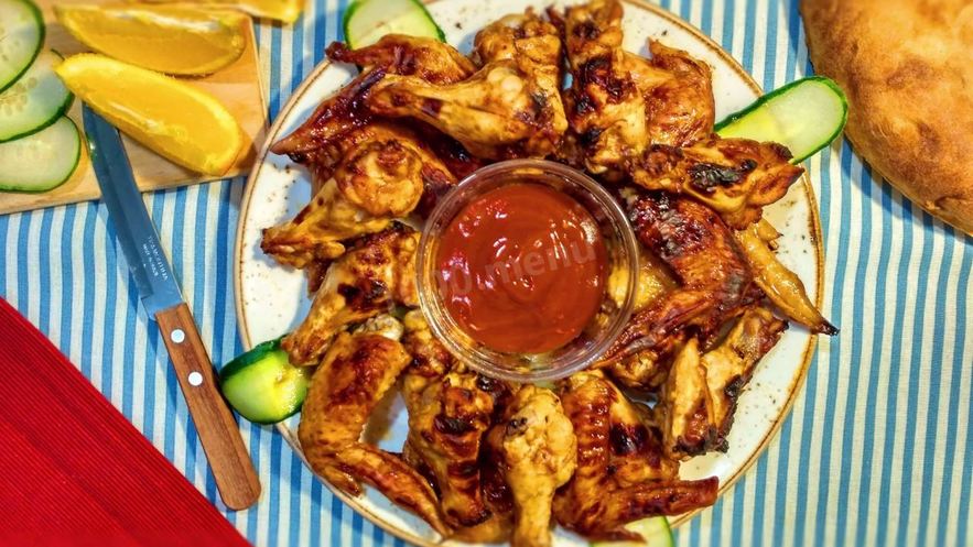 Рецепт куриных крылышек с медом солодом и ткемали