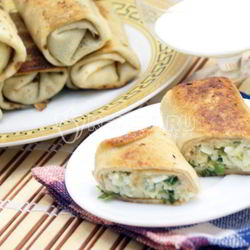 Рецепт Блинов на кефире, фаршированные яйцом, рисом и луком