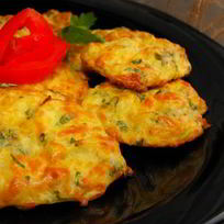 Простые капустные оладьи с сыром в духовке