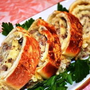 Рецепт Закусочных рулетов из слоеного теста