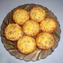 Тарталетки с жульеном в сыре с шампиньонами